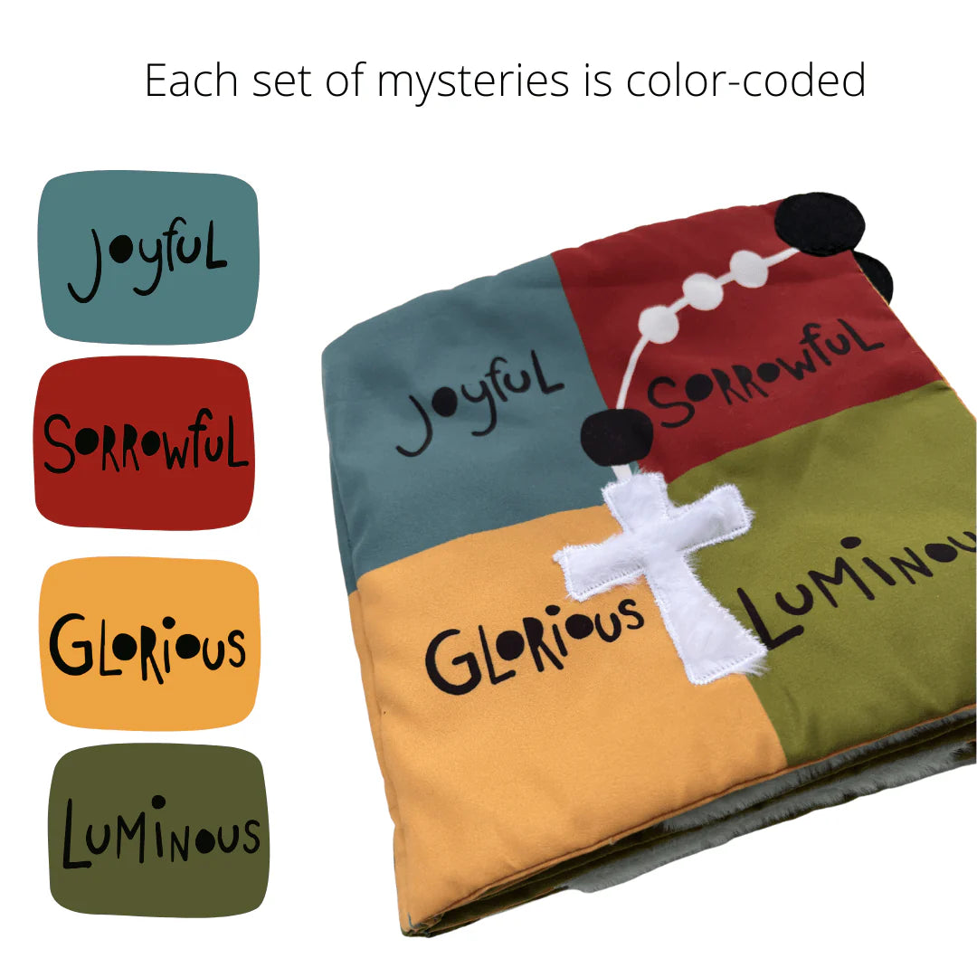 Color-coded fabric square panels labeled joyful, sorrowful, glorious, and luminous with white rosary and cross on quiet book cover