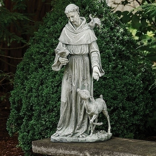 36.5" garden statue of St. Francis with detailed robes, holding a bird, and accompanied by a deer at his side.