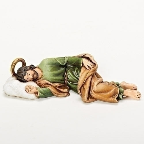 Sleeping St. Joseph statue in green and brown robes reclining on white pillow with golden halo detailed craftsmanship