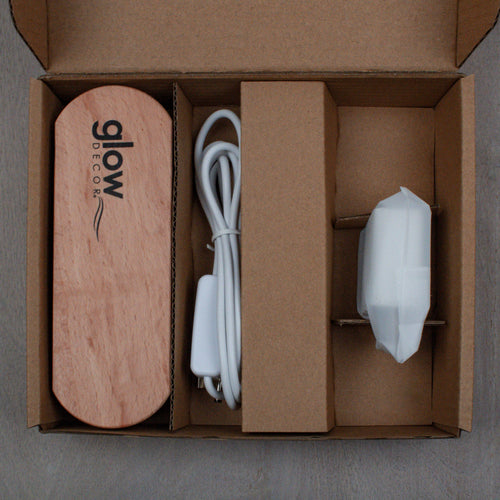 Wooden Glow Decor base, USB power cable, and nightlight component neatly packaged in cardboard box compartments