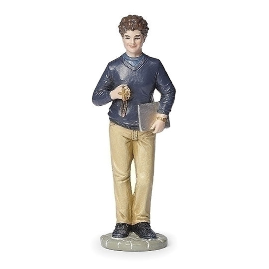 4" statue of Blessed Carlo Acutis holding a rosary and book, wearing navy sweater and tan pants on round base