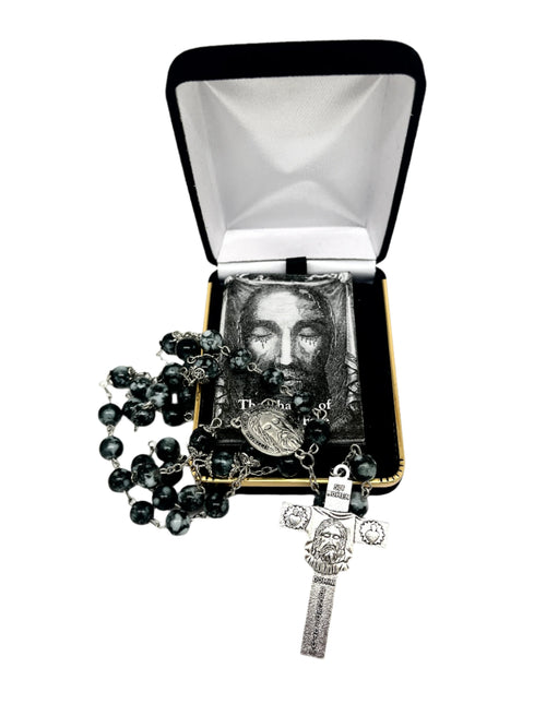 Holy Face Chaplet with marbled black glass beads, silver Medal of the Holy Face centerpiece, crucifix, and prayer card in black box