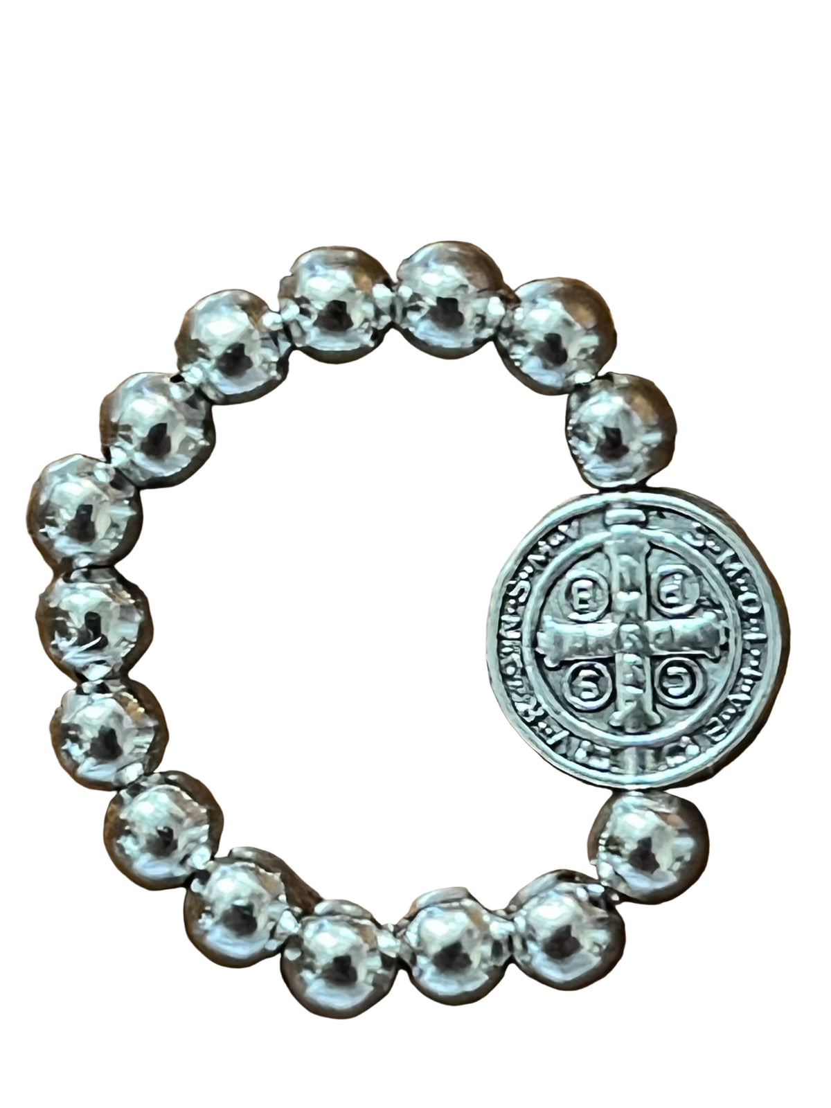 Silver stretch ring with polished round beads and detailed silver-tone Benedict medal centerpiece