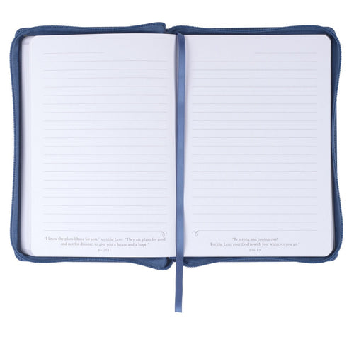 Open blue faux leather journal with lined pages, zipper closure, Isaiah 58:11 scripture quote on bottom edges