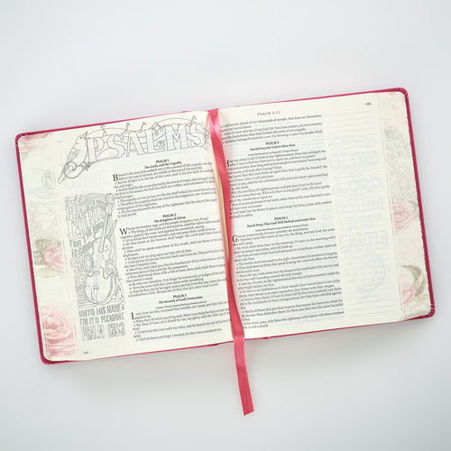 Bright pink faux leather hardcover KJV My Creative Bible open to illustrated Psalms page with ribbon marker
