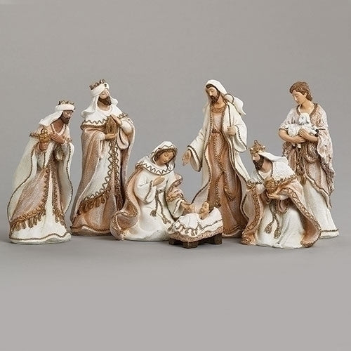 7-piece Nativity set with gold rope trim, fabric-look finish, featuring Mary, Joseph, baby Jesus, shepherd, and three wise men