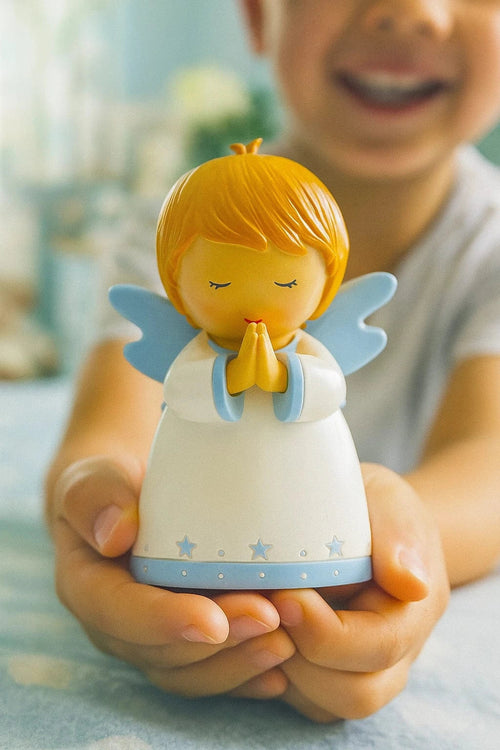 3.5" Guardian Angel for Boys Little Drops figurine with orange hair, blue wings, and white robe held by child hands