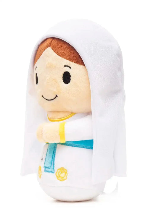 9" plush doll of Our Lady of Lourdes with white veil, blue sash, and yellow floral accents on white background